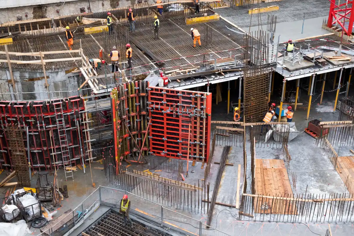 Apartment block frame under construction, illustrative