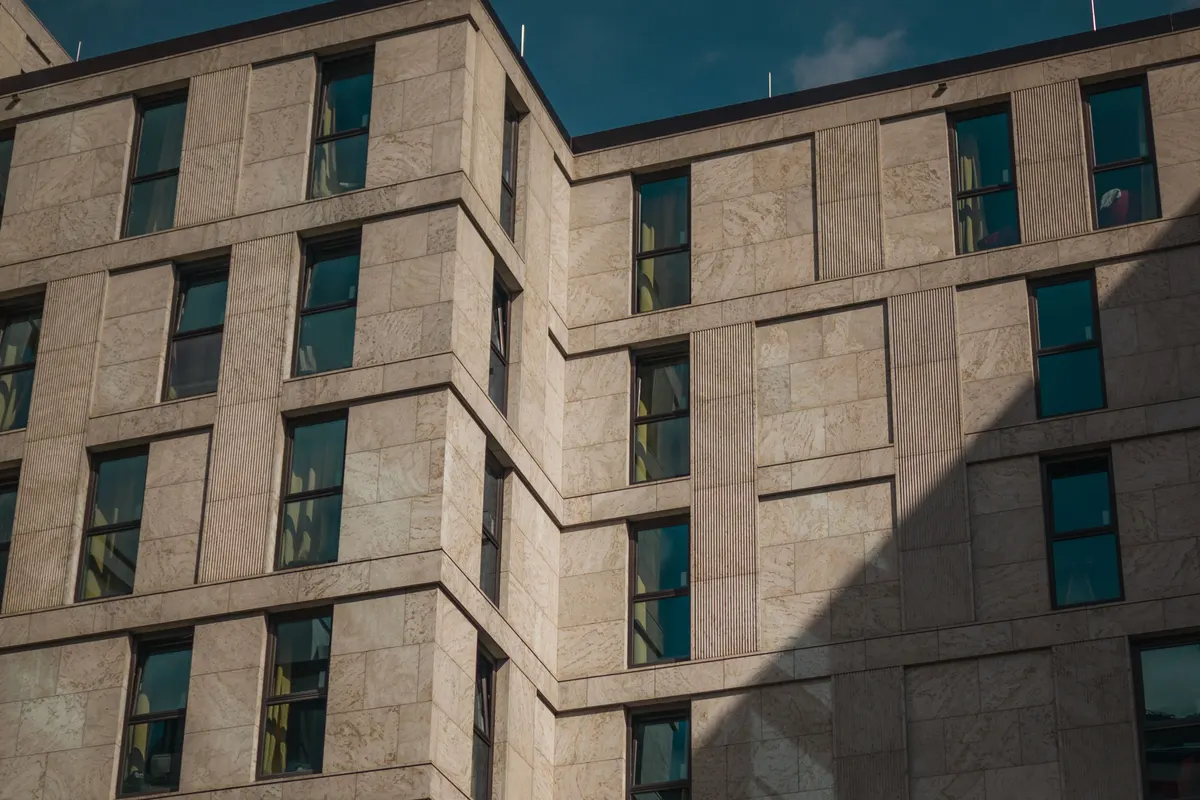 Stone-clad city-centre building, illustrative