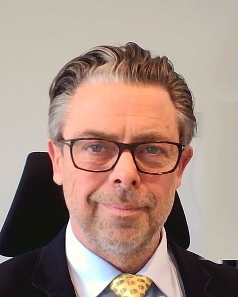 Justin, Principal, bridging.fund